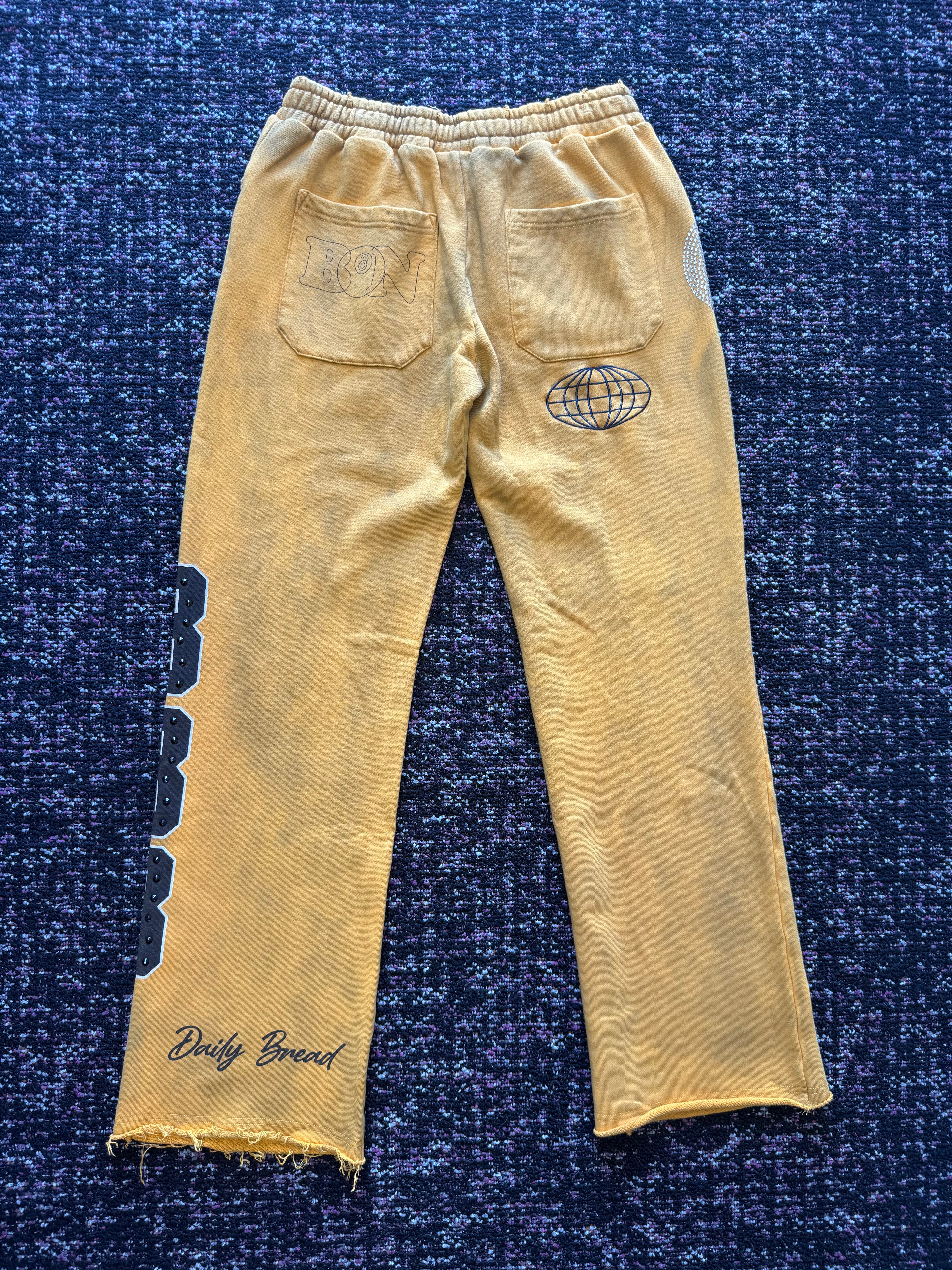 Trap Improvement Gold Sweats